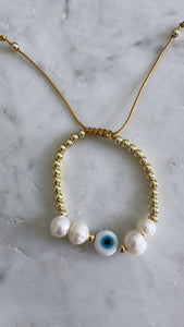 Pearl/evil eye bracelet