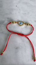 Evil eye/heart string bracelet